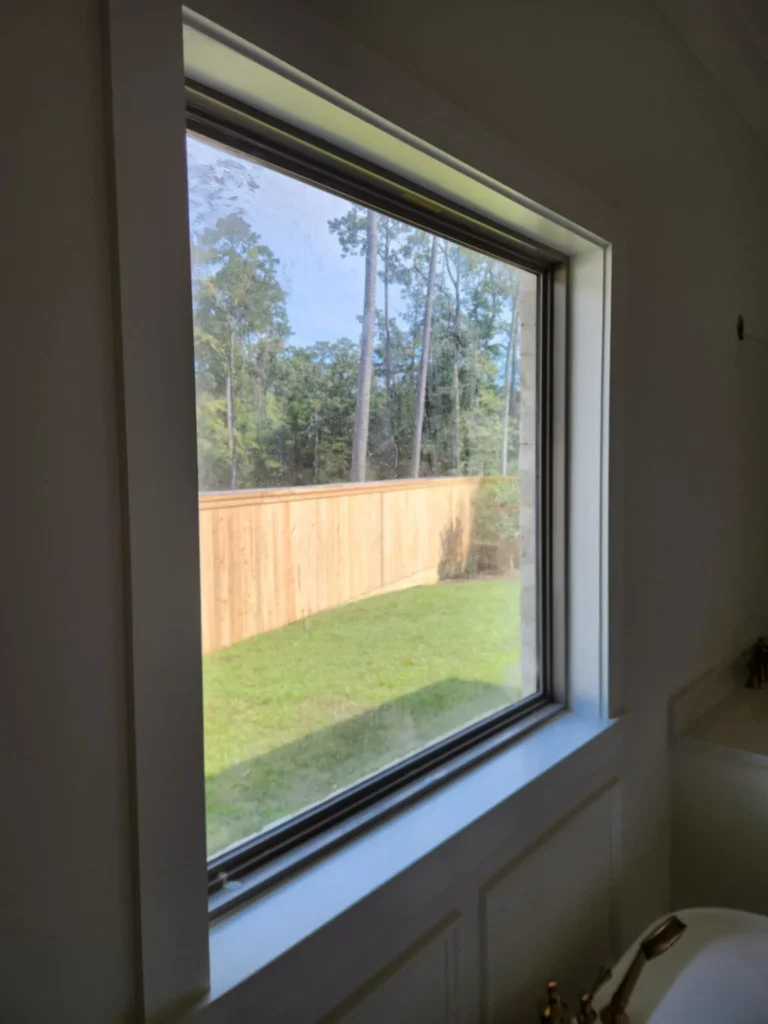 construction window clean - before - Riverfront Window Cleaning in Covington