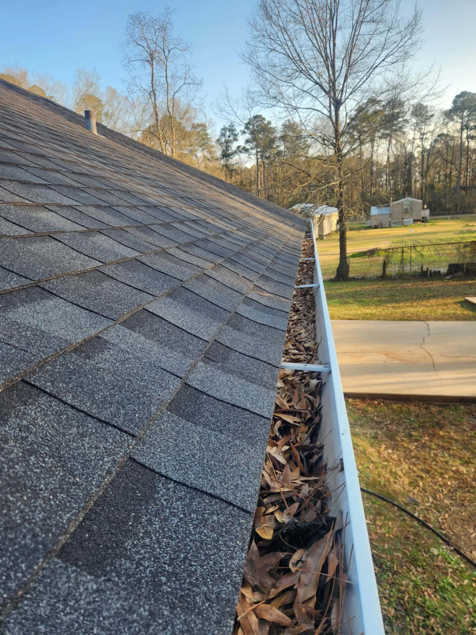 gutter clean before Riverfront Window Cleaning in Covington